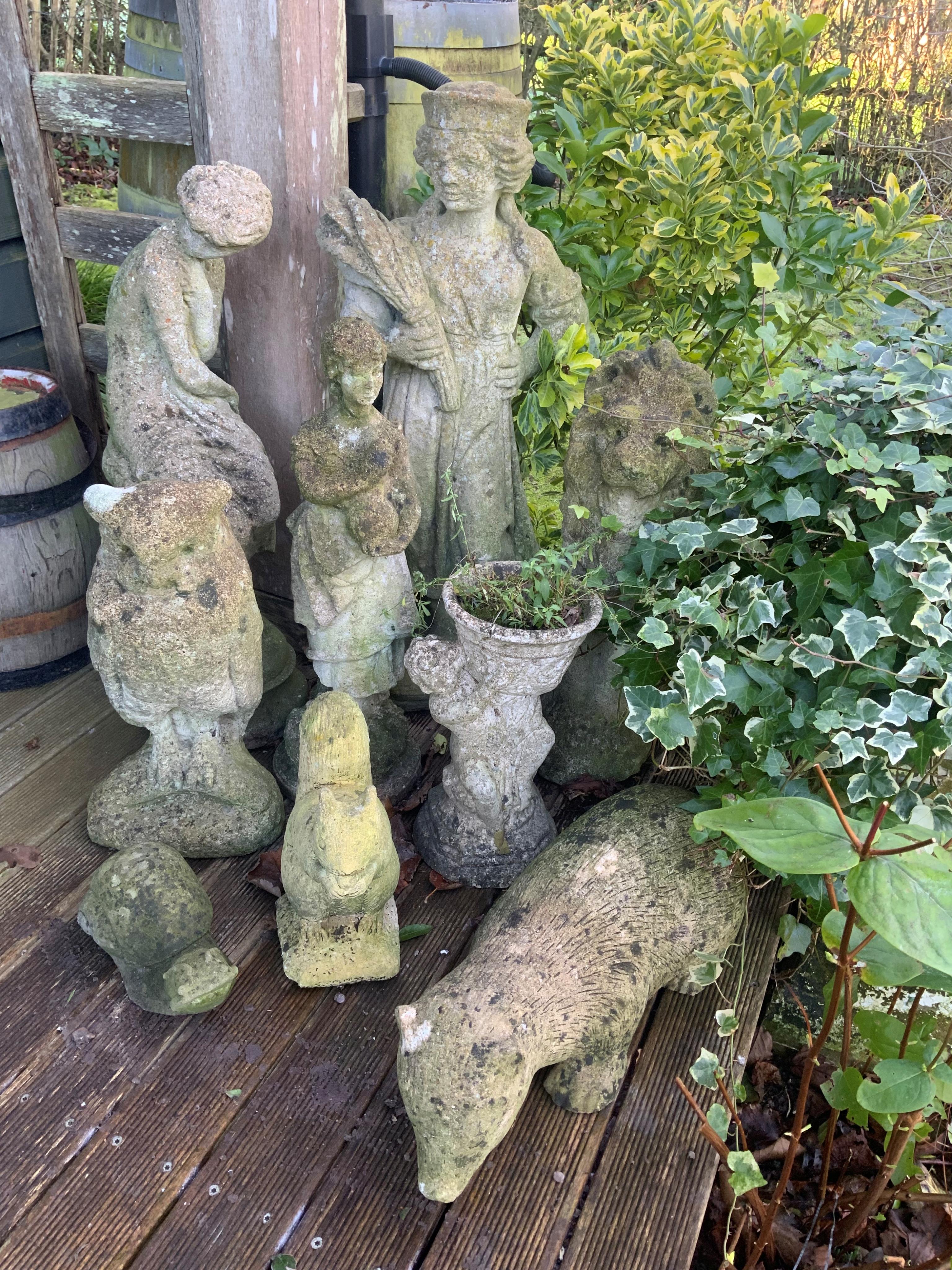 Nine various reconstituted stone models of figures and animals, largest height 77cm. Condition - fair